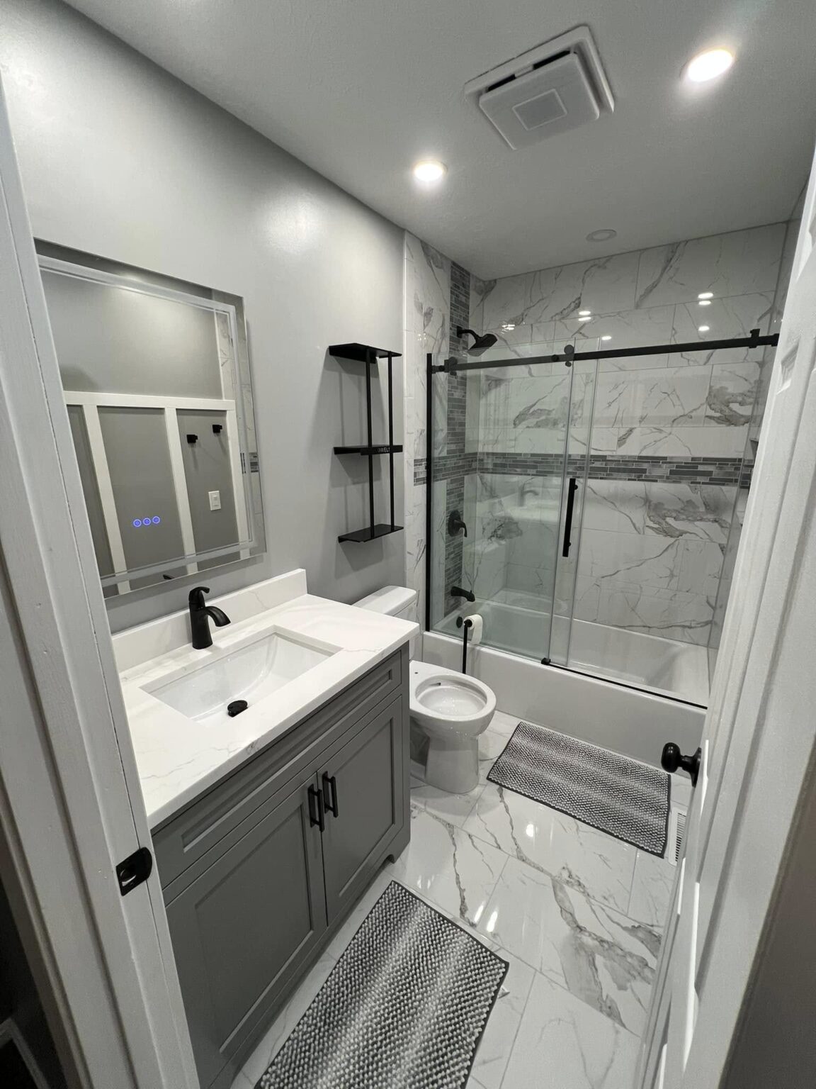 Finished bathroom, tile and glass
